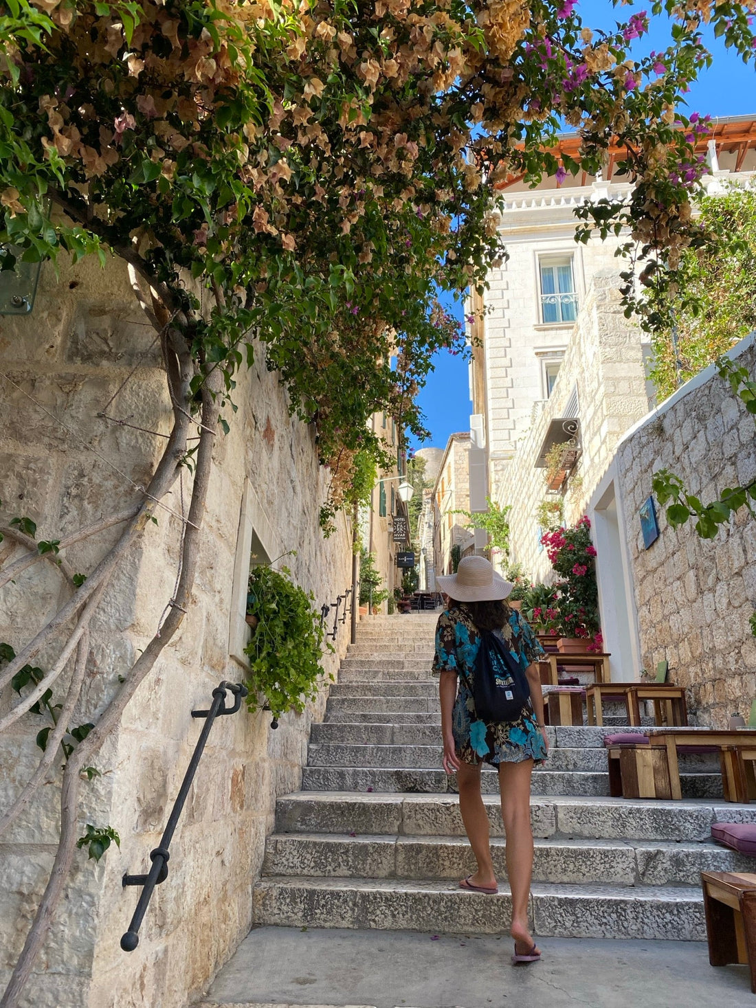 A narrow, stone-lined street in Hvar town, Croatia.