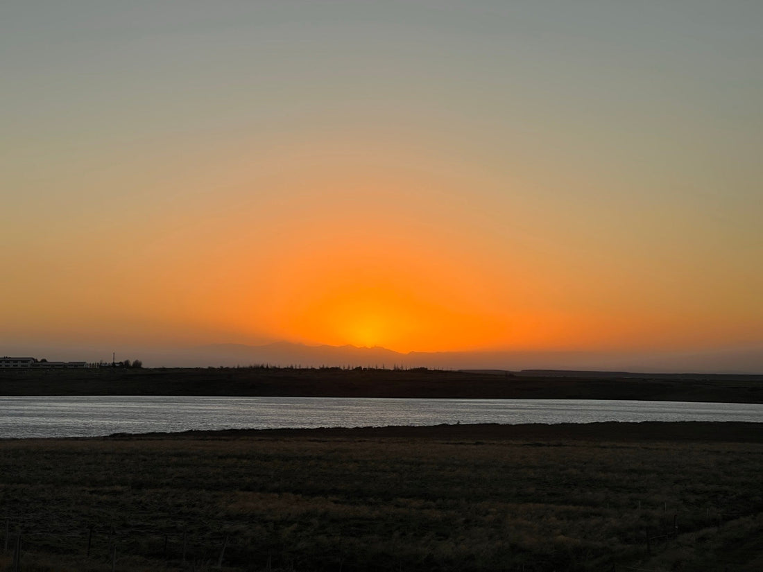 Sunset over a body of water