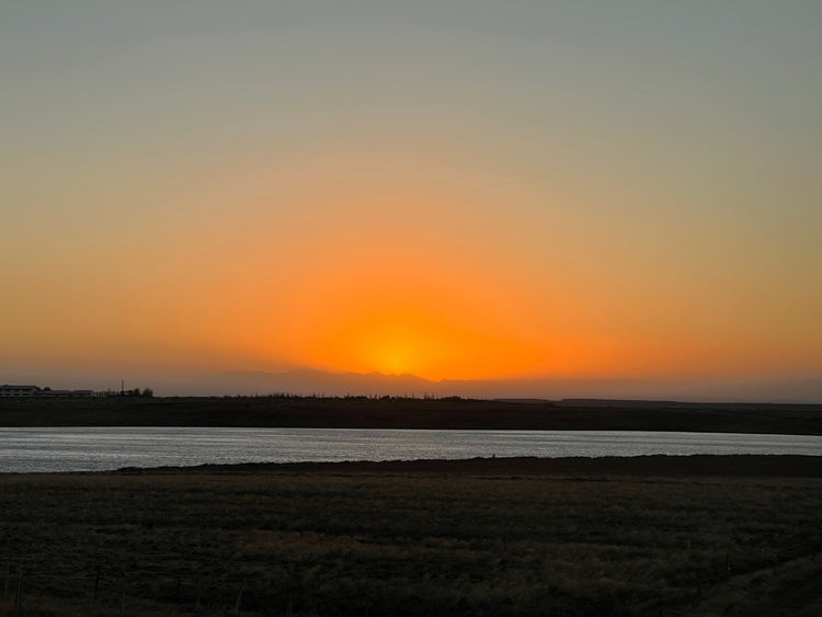 Sunset over a body of water